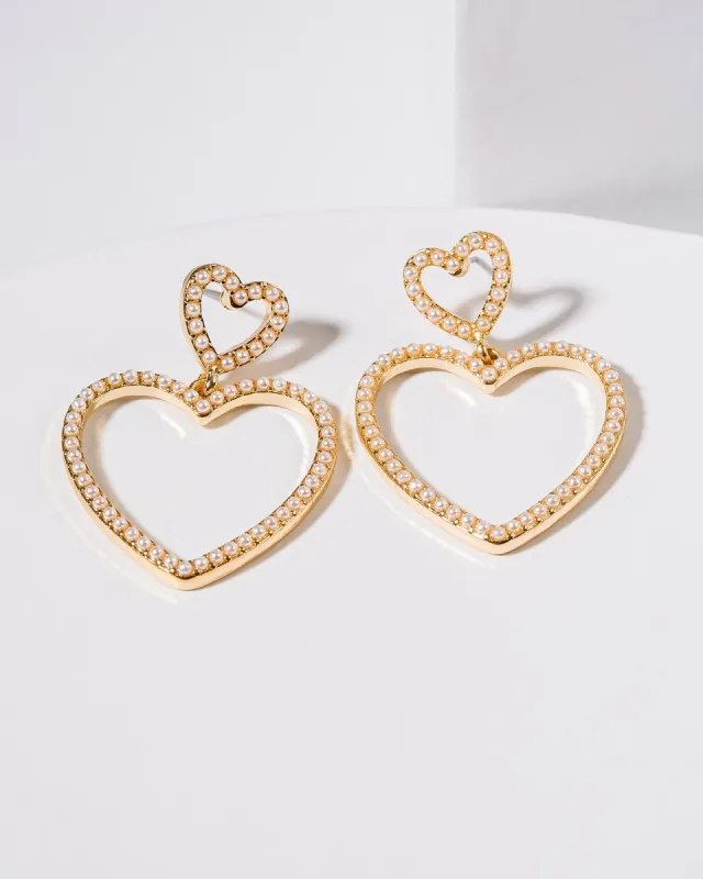 White Pearly Hearts Statement Earrings sold by Collete Hayman