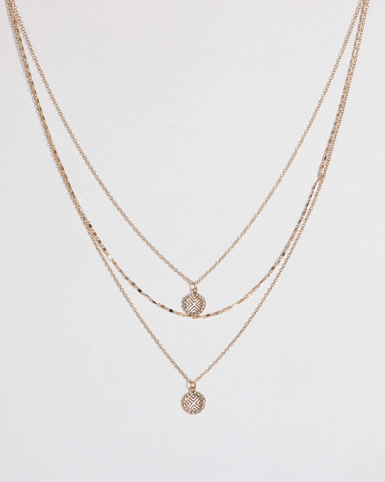 Gold Fine Cross Multi Necklace sold by Collete Hayman