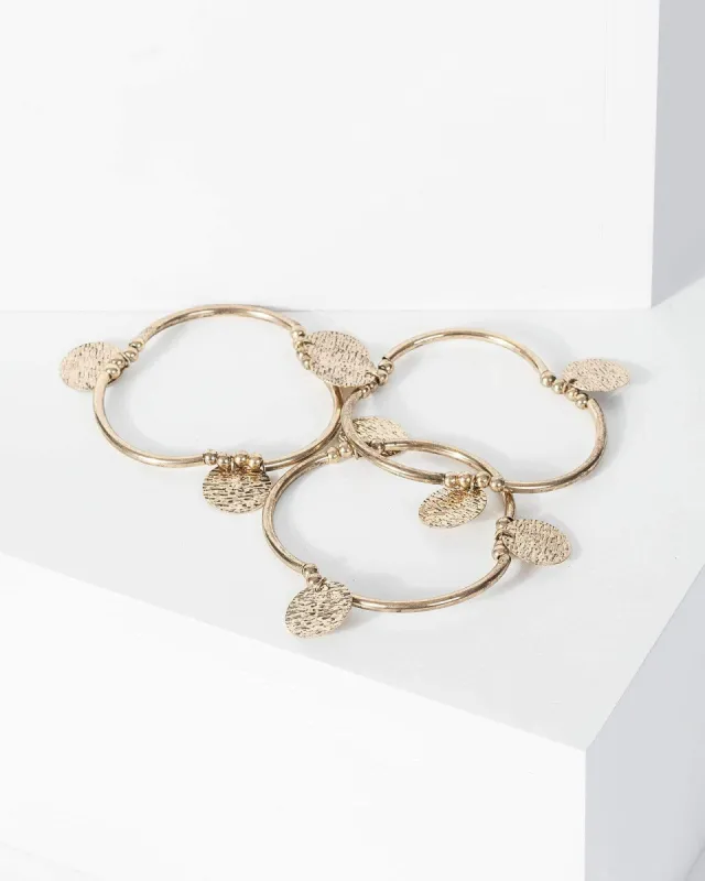 Gold Hammered Disc Stretch 3 Pack Wristwear sold by Collete Hayman