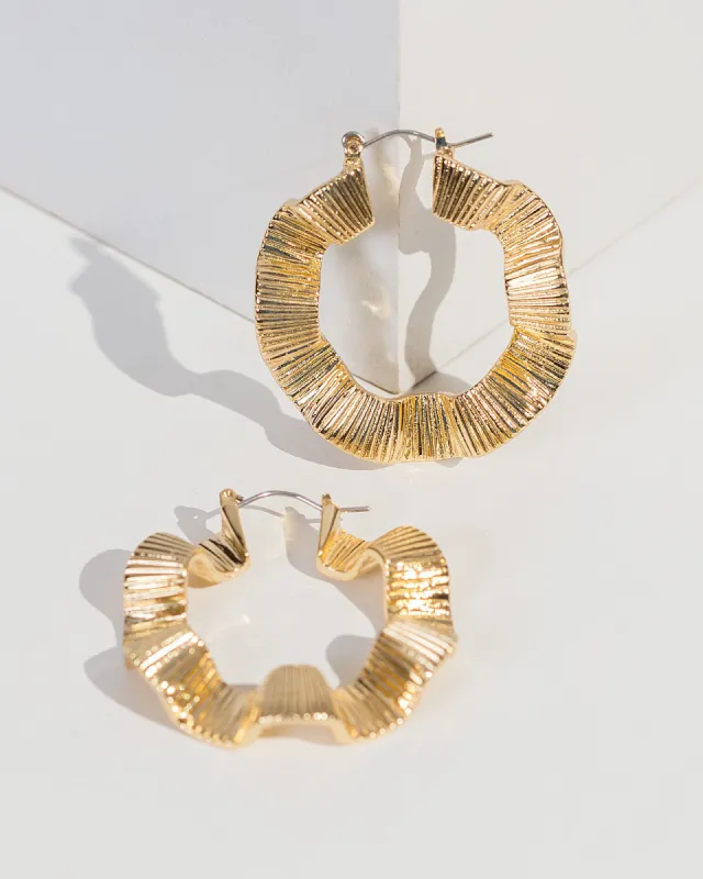 Gold Wiggly Textured Hoop Earrings sold by Collete Hayman