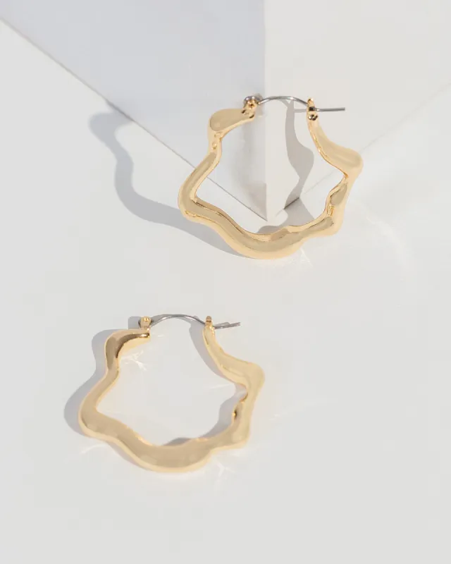 Gold Drippy Metal Hoop Earrings sold by Collete Hayman