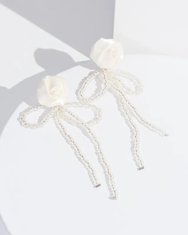 White Flower Detail Drop Earrings sold by Collete Hayman