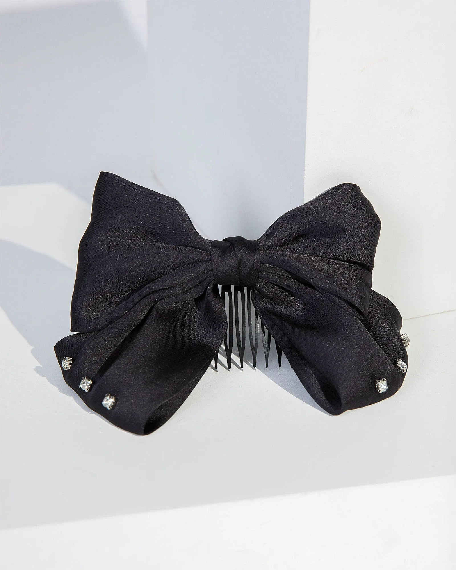Black Fabric Bow Hair Comb sold by Collete Hayman