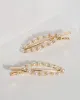 Pearl Oval and Crystal Hair Clips sold by Collete Hayman