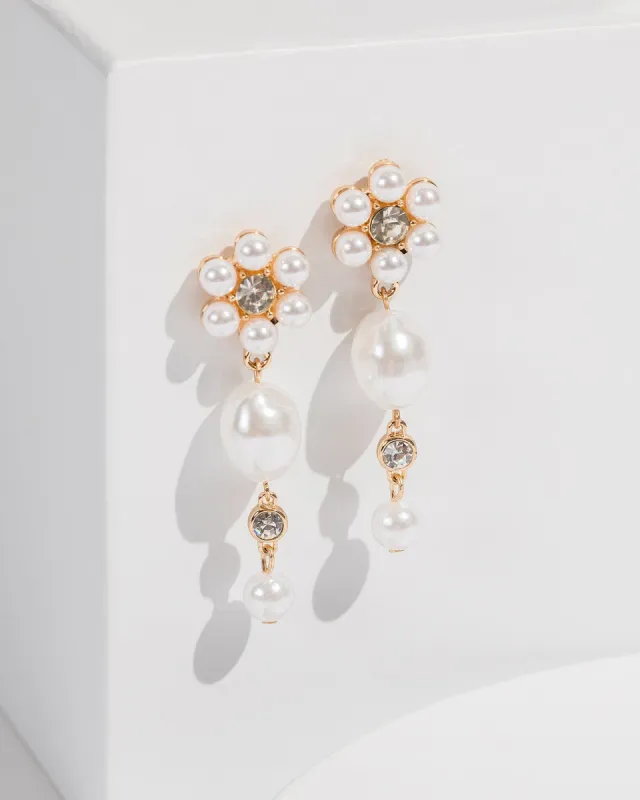 White Crystal Flower Pearl Drop Earrings sold by Collete Hayman
