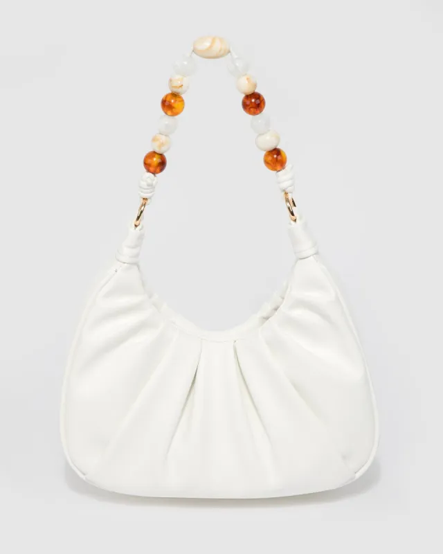 White Tess Beaded Handle Shoulder Bag sold by Collete Hayman