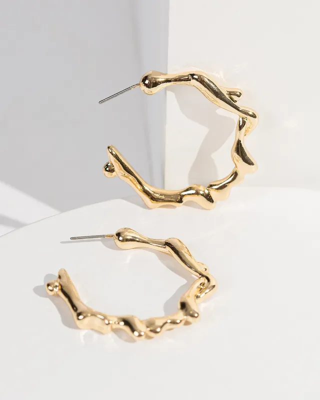 Gold Twisted Thin Hoops Earrings sold by Collete Hayman