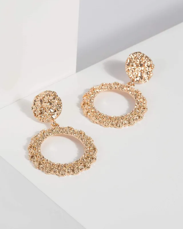 Gold Textured Circle Drop Earrings sold by Collete Hayman