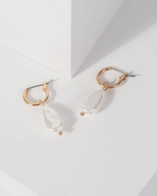 Gold Pearl Mini Hoop Earrings sold by Collete Hayman
