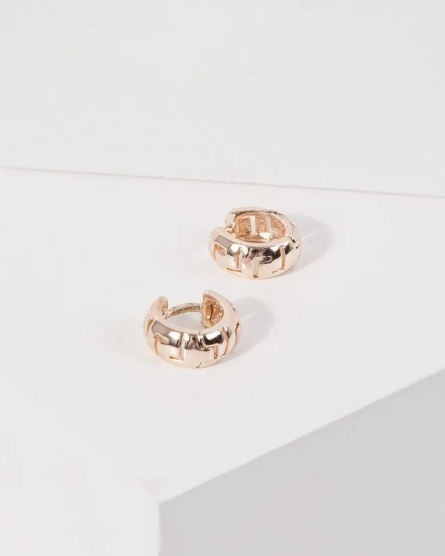 Rose Gold Wide Huggie Hoop Earrings sold by Collete Hayman