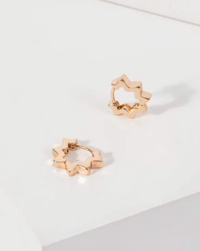Gold Star Point Huggie Hoop Earrings sold by Collete Hayman