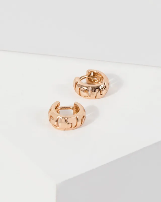 Gold Wide Huggie Hoop Earrings sold by Collete Hayman