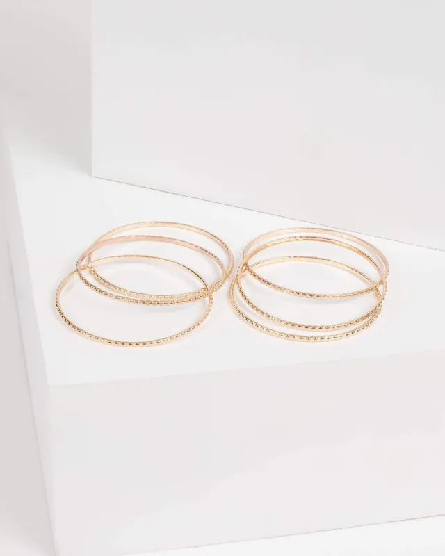 Gold Chain Pendant Bracelet Set sold by Collete Hayman