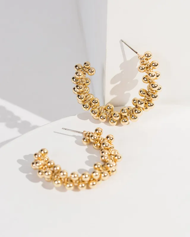 Gold Beaded Metal Hoop Earrings sold by Collete Hayman