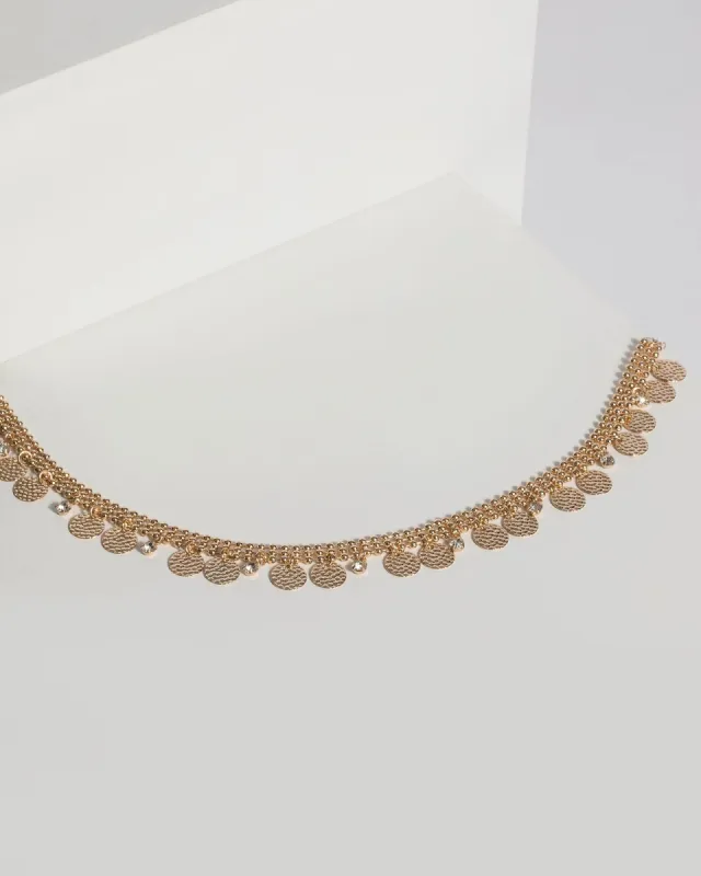Gold Hammered Disc Choker sold by Collete Hayman