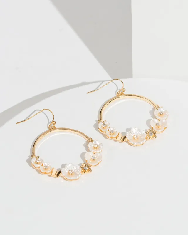 White Floral Halo Earrings sold by Collete Hayman