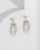 Silver Double Crystal Layer Earrings sold by Collete Hayman