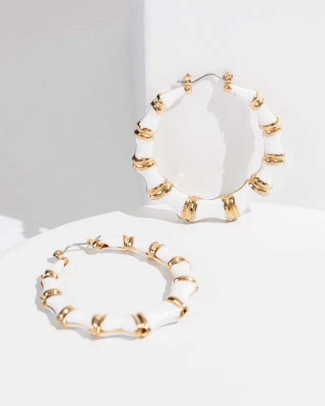White Painted Bamboo Hoop Earrings sold by Collete Hayman