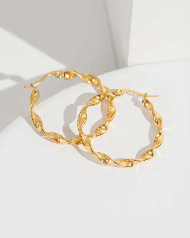 Twist Hoop Earrings sold by Collete Hayman