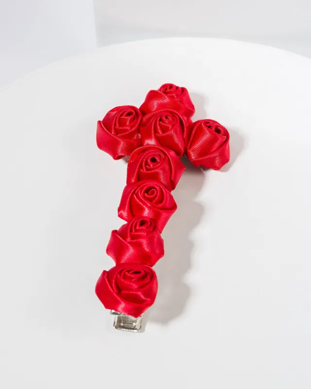 Red Rosette Cross Hair Clip sold by Collete Hayman