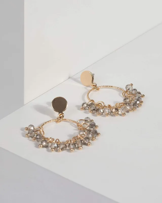 Gold Beaded Circle Drop Earrings sold by Collete Hayman