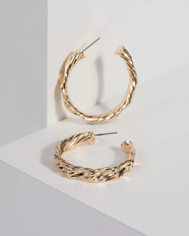 Gold Textured Organic Metal Hoop Earrings sold by Collete Hayman