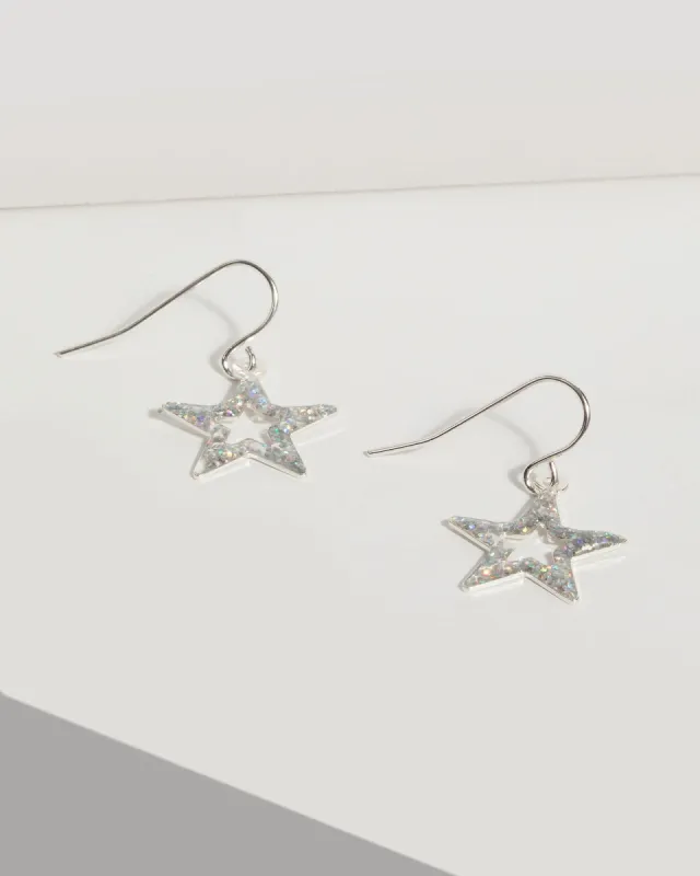 Silver Glitter Star Drop Earrings sold by Collete Hayman