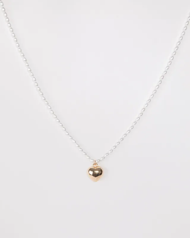 White Pearl Beaded Charm Necklace sold by Collete Hayman