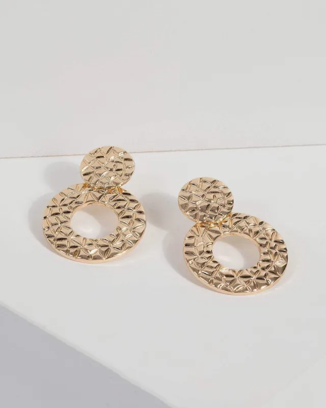 Gold Textured Metal Drop Earrings sold by Collete Hayman