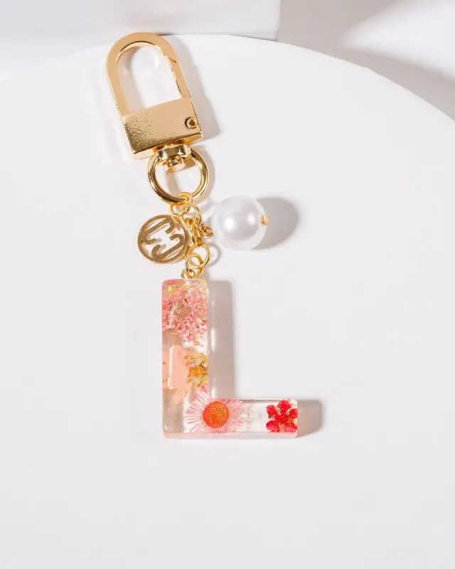 L - Initial Bag Charm Pearl sold by Collete Hayman
