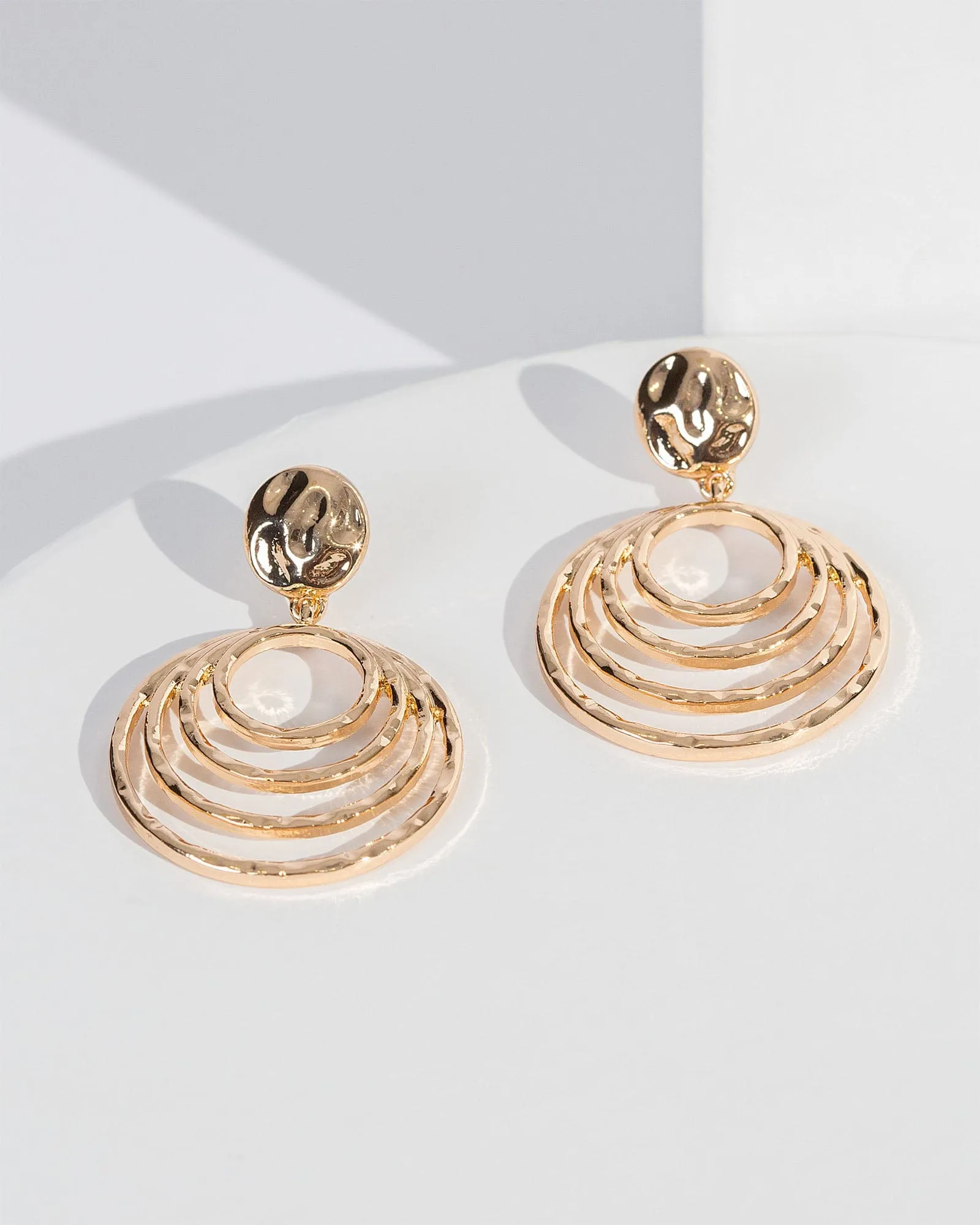 Gold Multi Circle Drop Earrings sold by Collete Hayman
