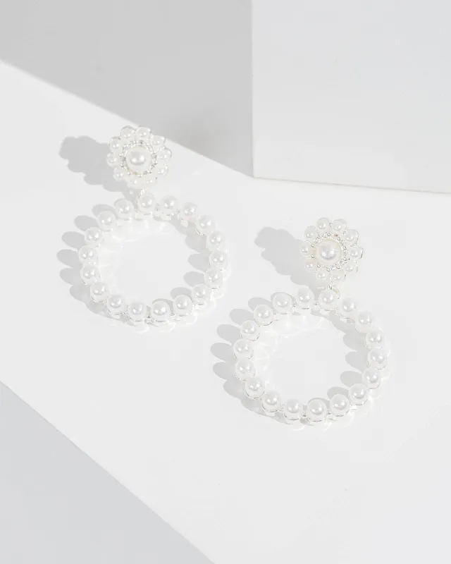 White Pearl Halo Drop Earrings sold by Collete Hayman