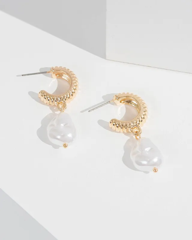 White Textured Huggie Hoop Earrings sold by Collete Hayman