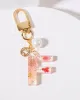 F - Initial Bag Charm Pearl sold by Collete Hayman