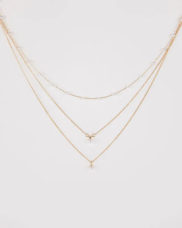 White Triple Layered Pearl Necklace sold by Collete Hayman