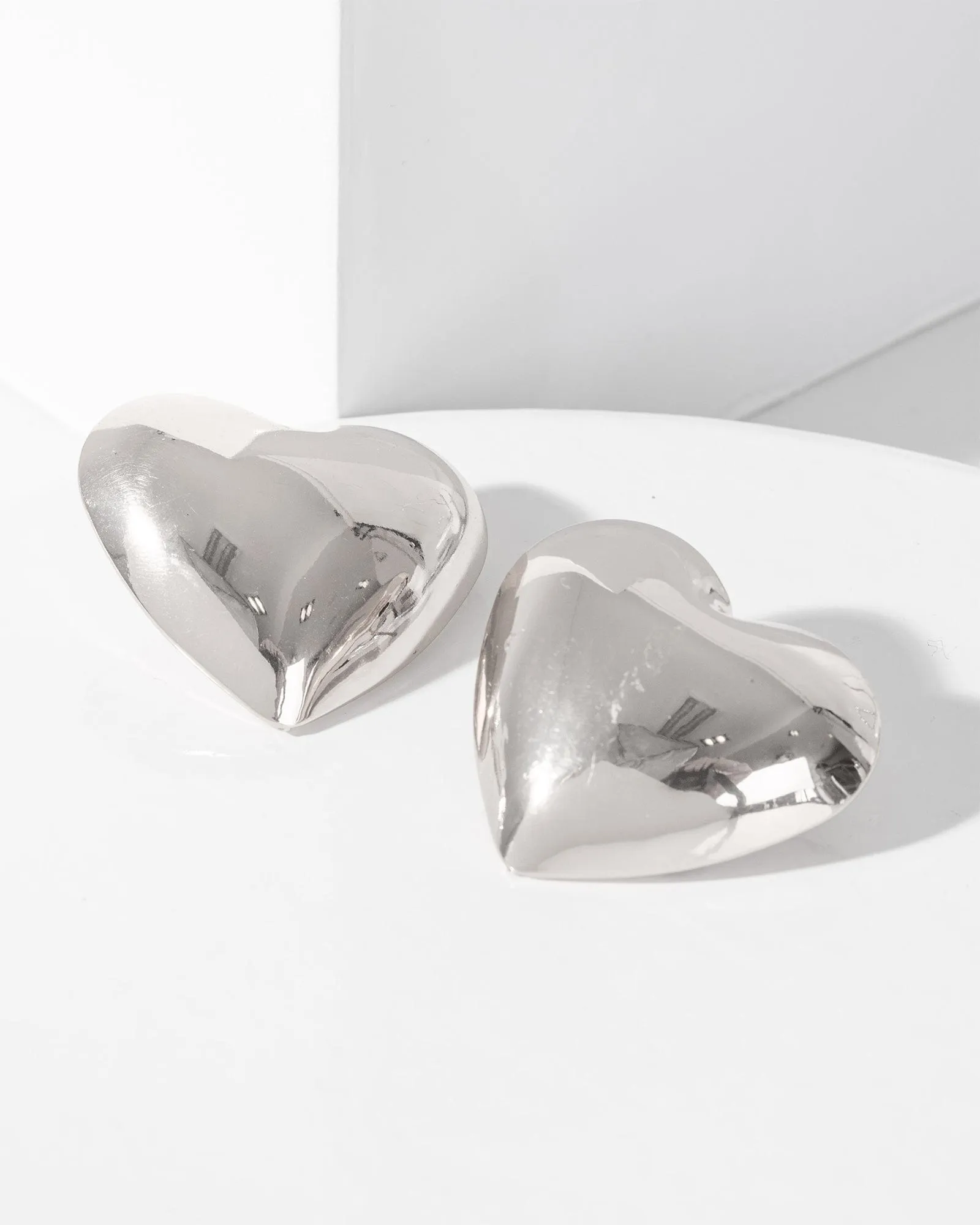 Silver Puffy Heart Oversize Stud Earrings sold by Collete Hayman