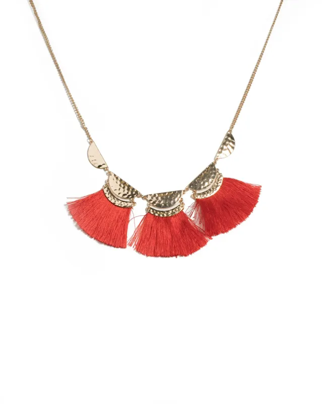 Red Gold Tone Hammered Disk Tassel Necklace sold by Collete Hayman