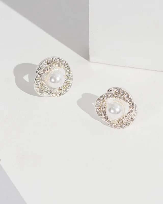 Pearl And Crystal Cross Over Stud Earrings sold by Collete Hayman