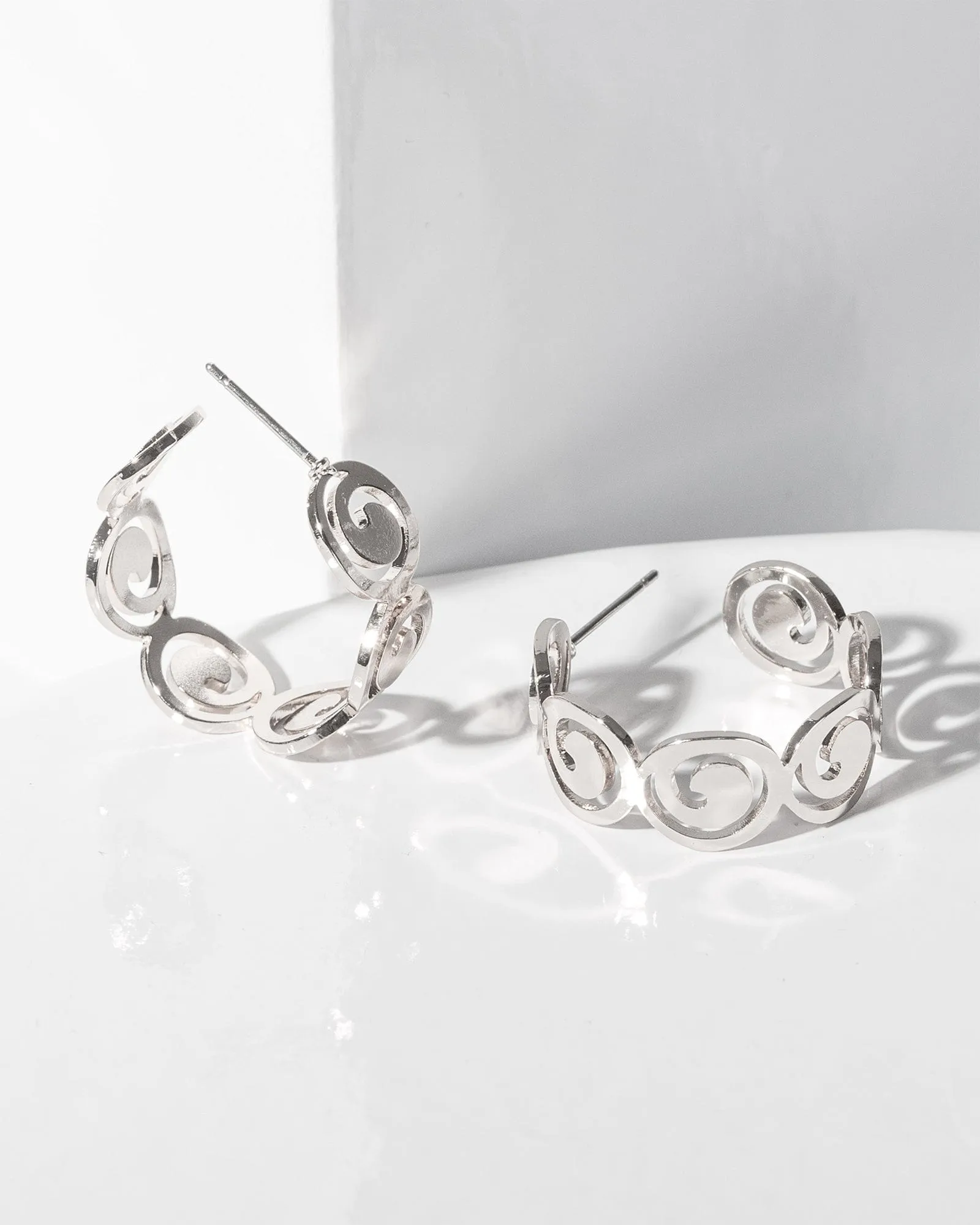 Silver Spiral Hoop Earrings sold by Collete Hayman