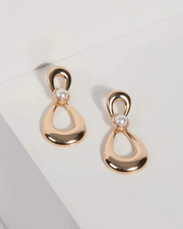 Pearl and Metal Drop Earrings sold by Collete Hayman