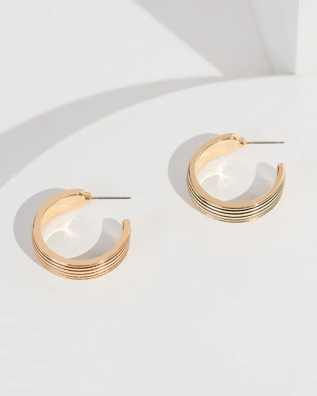 Gold Textured Stud Hoop Earrings sold by Collete Hayman