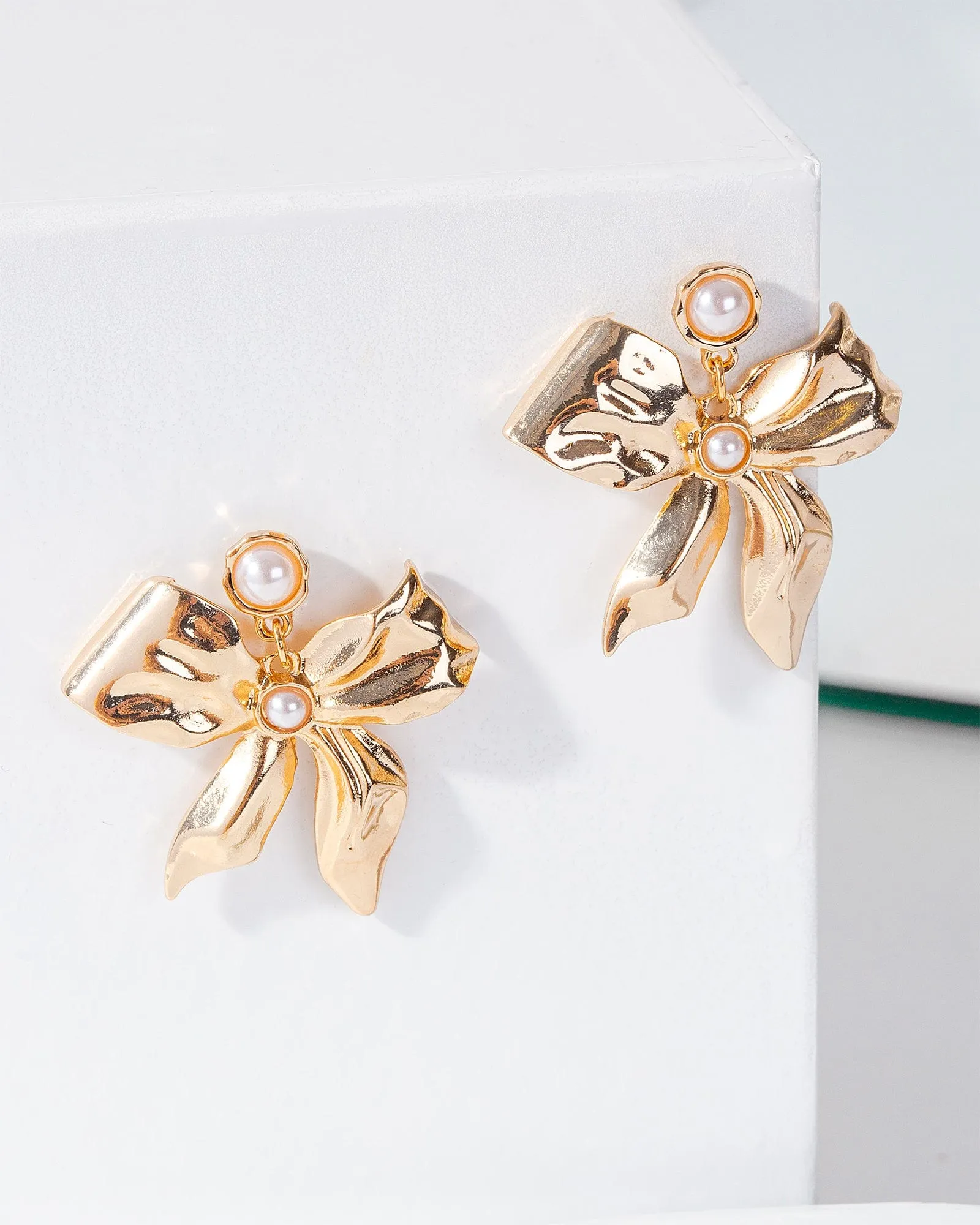 Gold Large Bow Drop Earrings sold by Collete Hayman