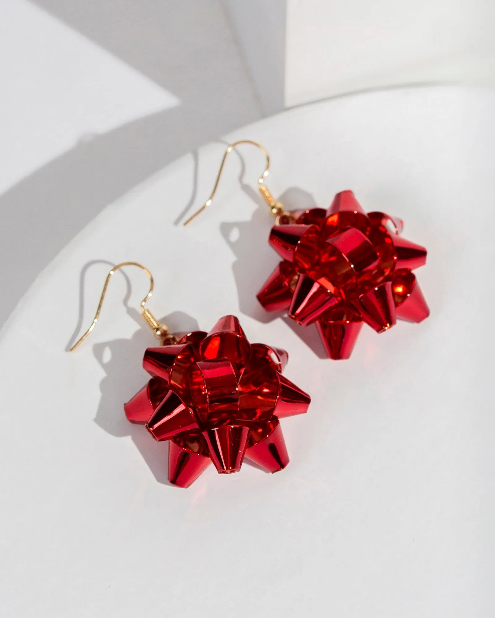 Red Christmas Bow Hook Earrings sold by Collete Hayman