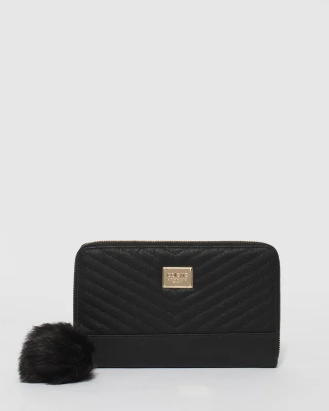 Black Nina Travel Wallet sold by Collete Hayman