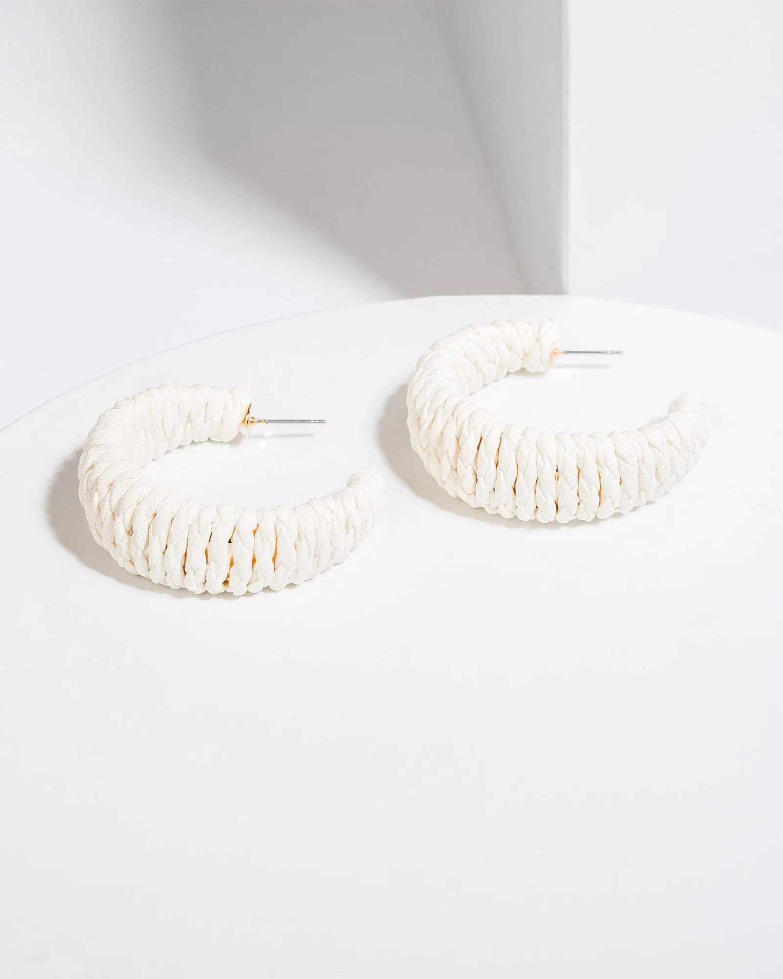 White Wrapped Cord Hoop Earrings sold by Collete Hayman