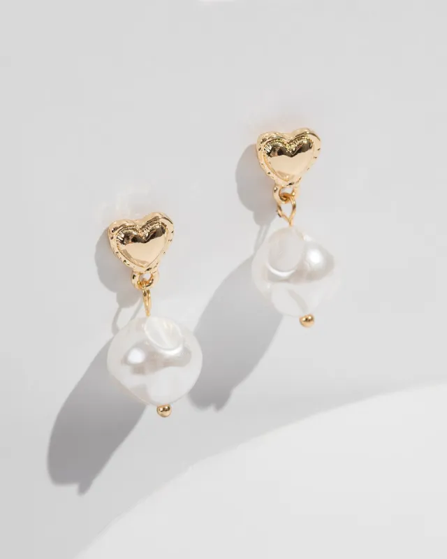 White Heart With Pearl Drop Earrings sold by Collete Hayman