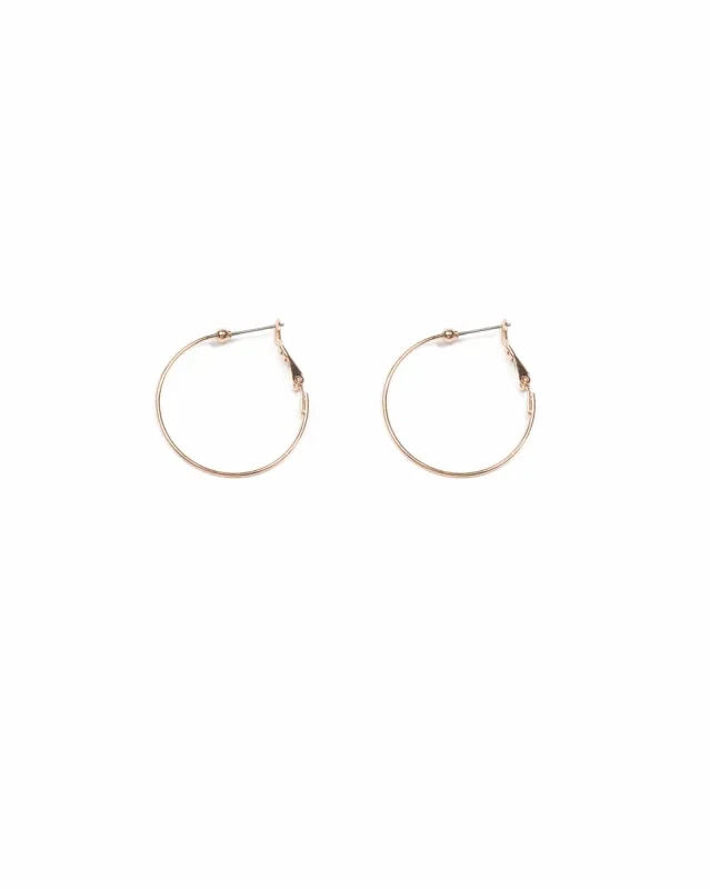 Rose Gold Tone Fine Metal Small Hoop Earrings sold by Collete Hayman