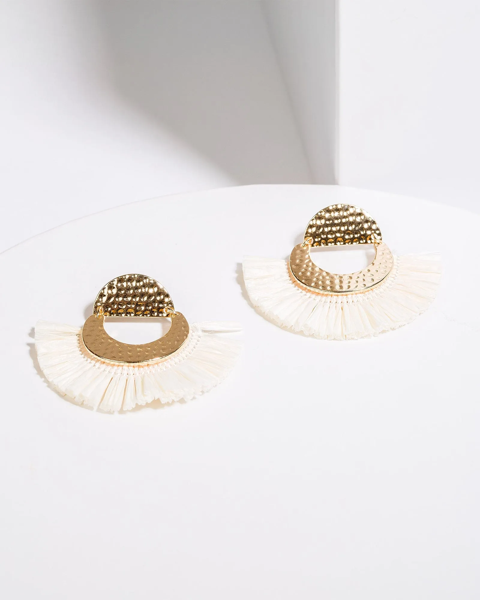 White Raffia Circle Earrings sold by Collete Hayman
