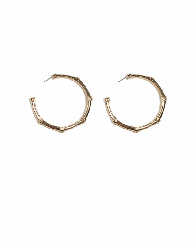 Gold Tone Bamboo Style Hoop Earrings sold by Collete Hayman