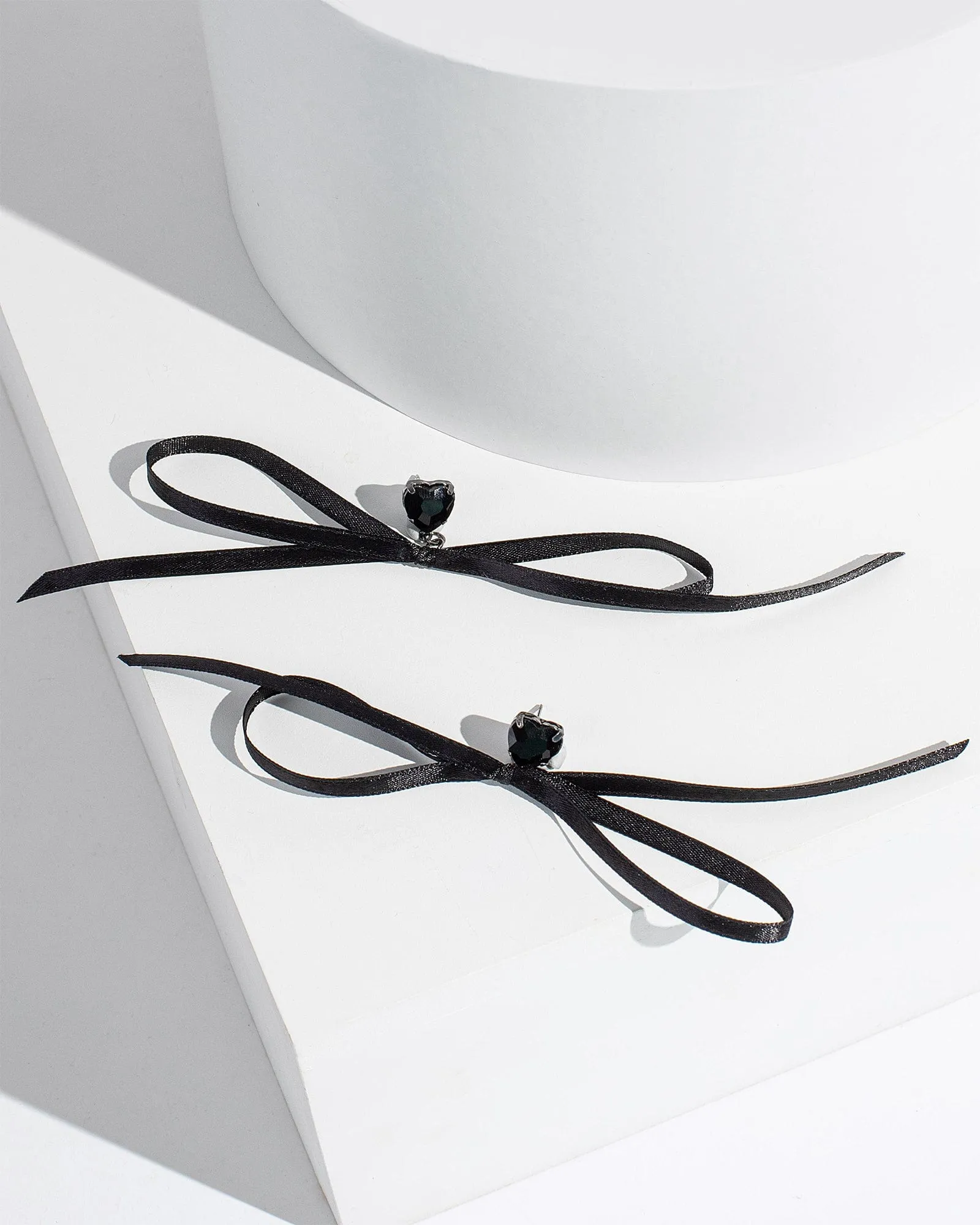 Black Ribbon Bow Earrings sold by Collete Hayman